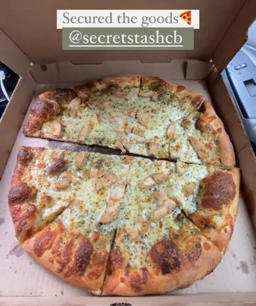 Pizza with pesto sauce, cheese, and chicken from Secret Stash in Crested Butte, Colorado.