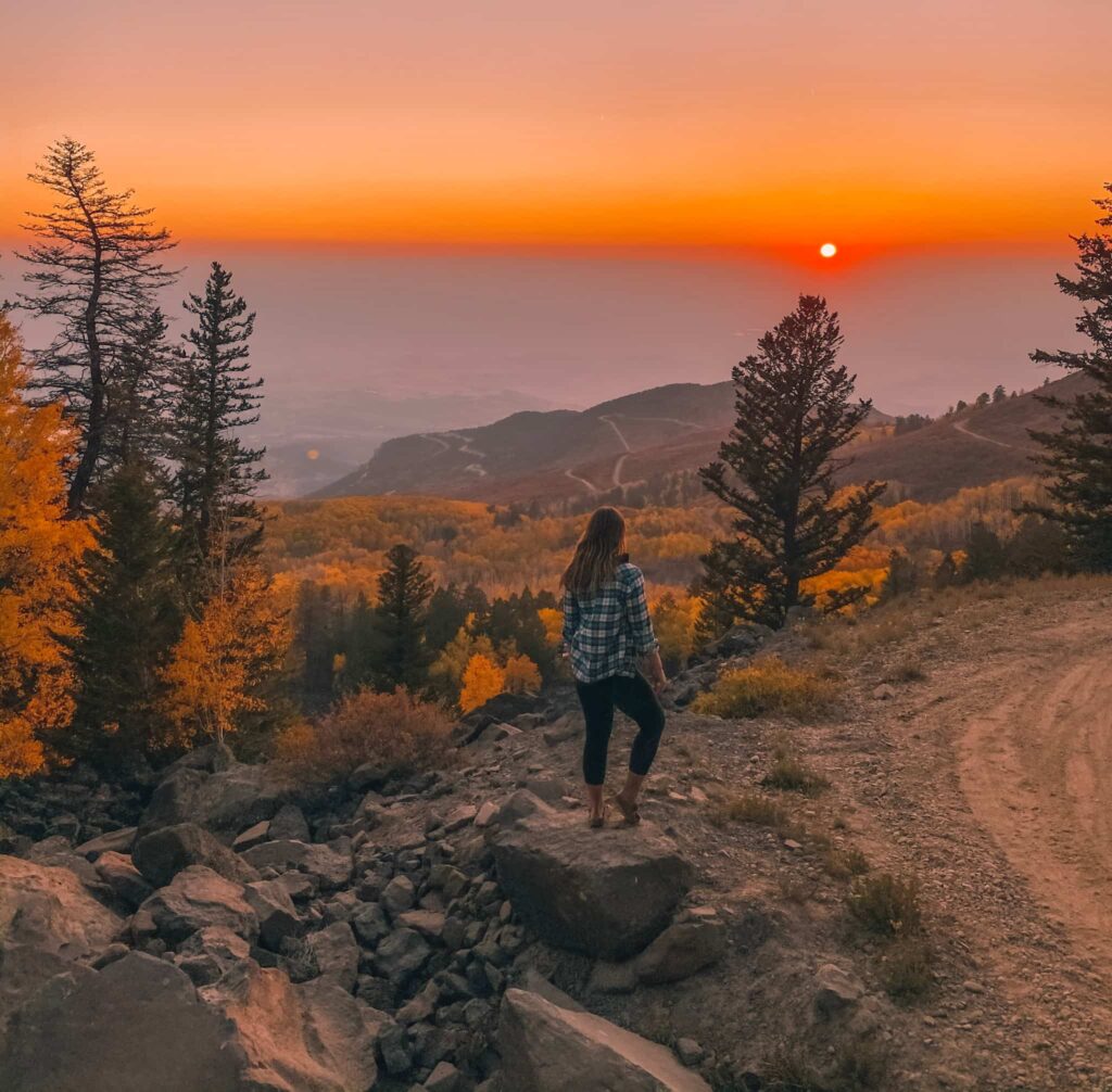A smoky fall sunset on Lands End Road on the Grand Mesa in Grand Junction.