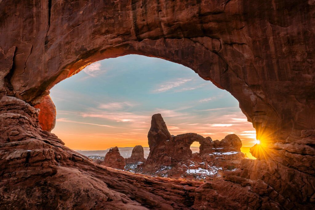 Sunset at the Windows overlooking Turret Arch in Arches National Park at sunset in Moab.