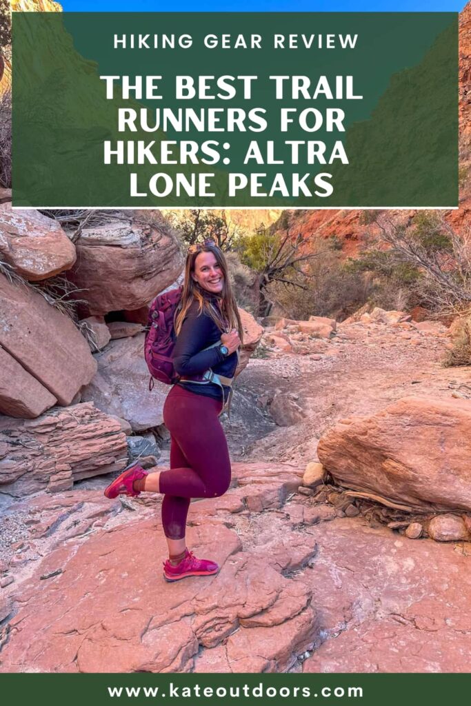 A woman flicking her hot pink hiking shoe up while hiking in a canyon.